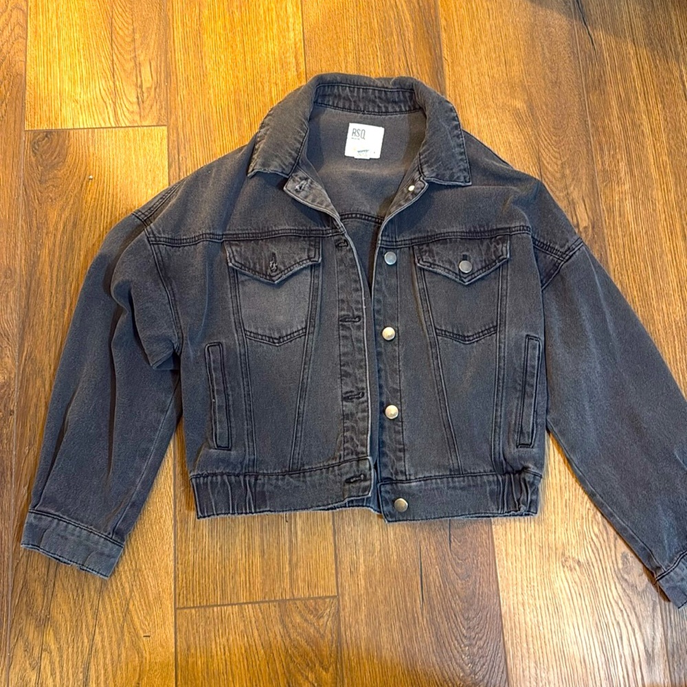 Women’s faded jean jacket grayish black. Like new never worn